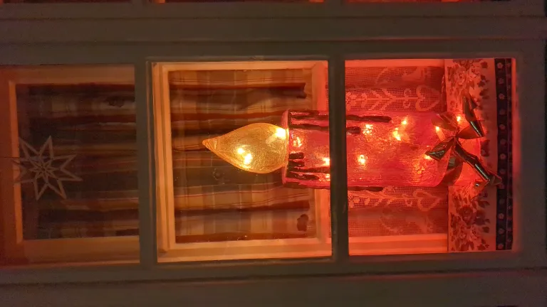 Candle in the window in St.Gilgen